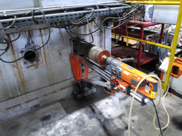 Recentrage des trous d'installation des br&ucirc;leurs industriels &agrave; la carotteuse